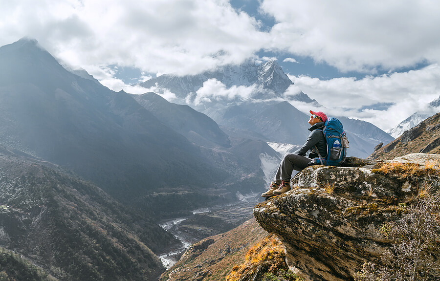 bigstock-Young-Hiker-Female-Backpacker-376306528